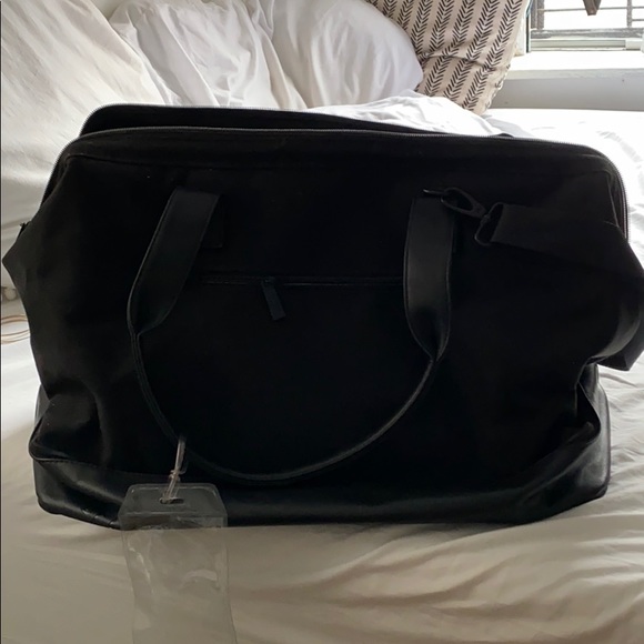 beis duffle bag